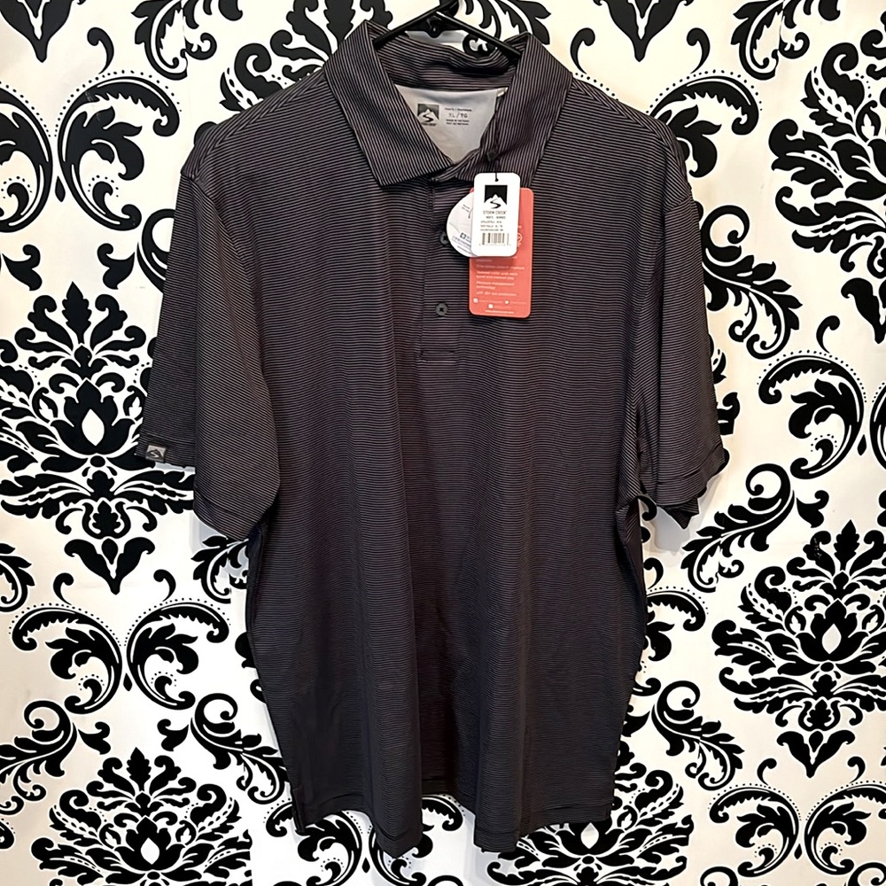 New with tags, never worn. Men’s XL polo.
